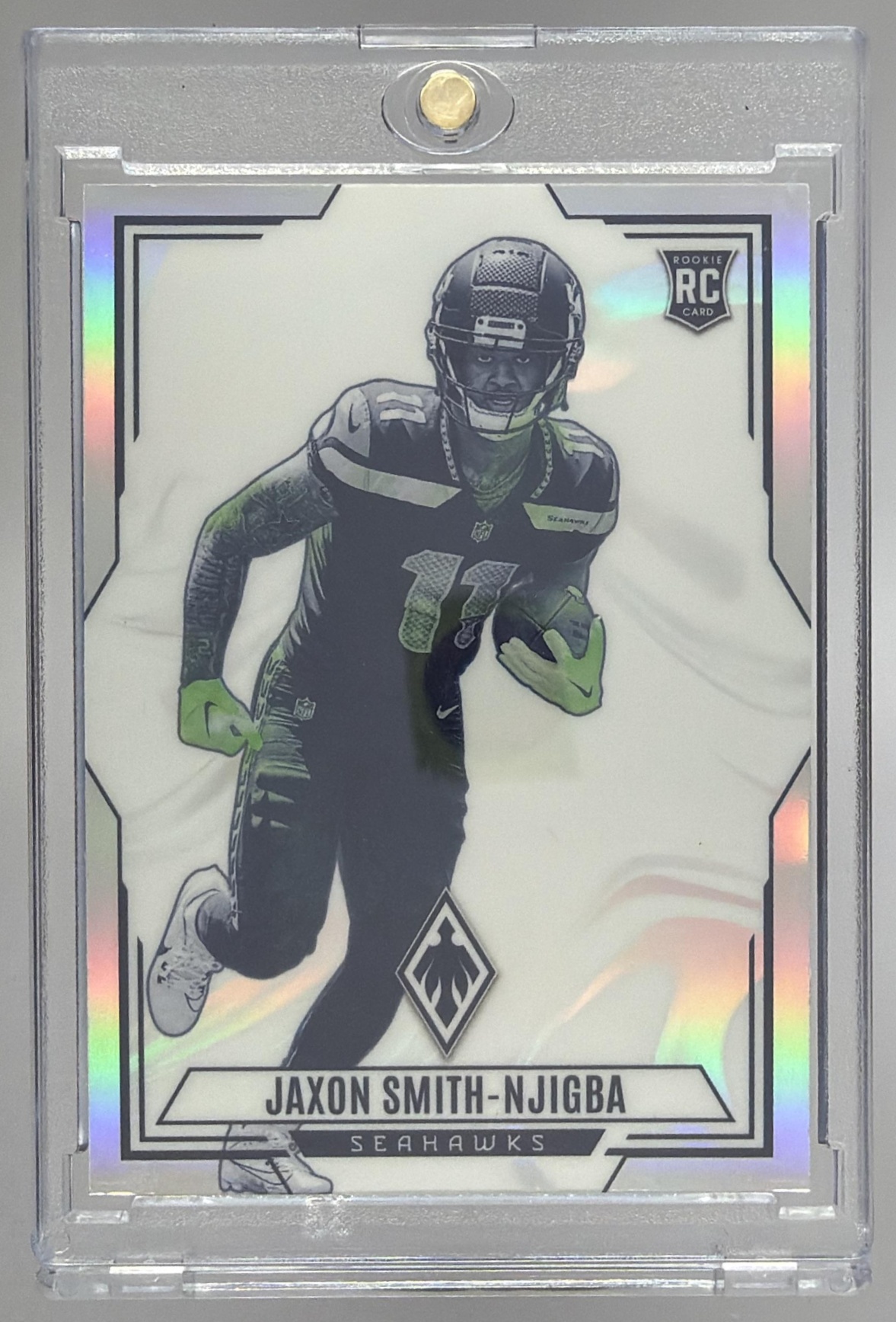 Card image for 2023 Panini Phoenix Jaxon Smith-Njigba Contours #CON-4 RC Seahawks