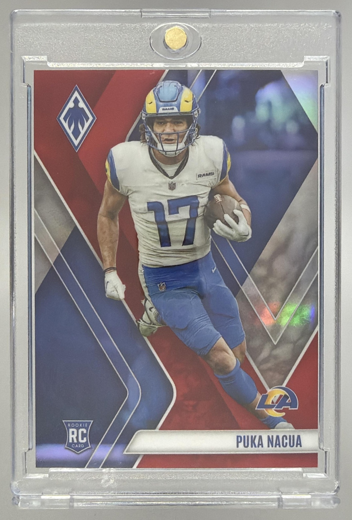 Card image for 2023 Panini Football Phoenix Puka Nacua Red /250 #200 RC Los Angeles Rams