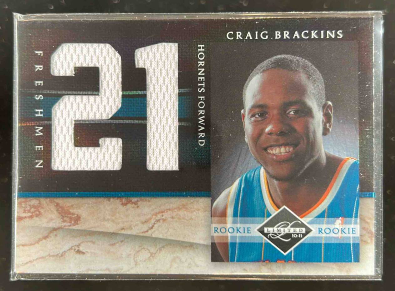 Card image for 2010-11 PANINI LIMITED CRAIG BRACKINS FRESHMEN JUMBO JERSEY NUMBERS /99 #21 RC