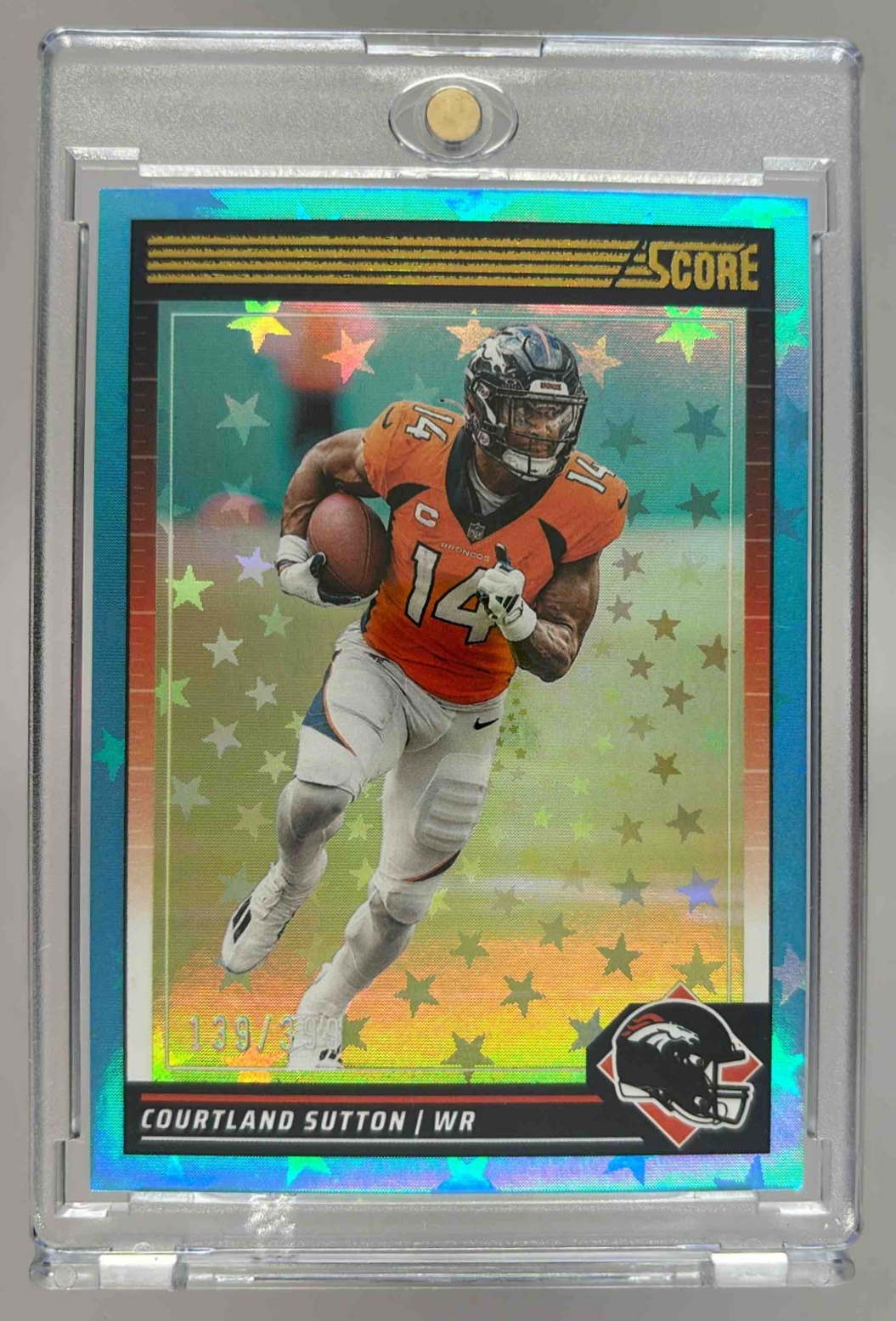 Card image for 2024 Panini Football Score Courtland Sutton Stars /399 #87 Denver Broncos