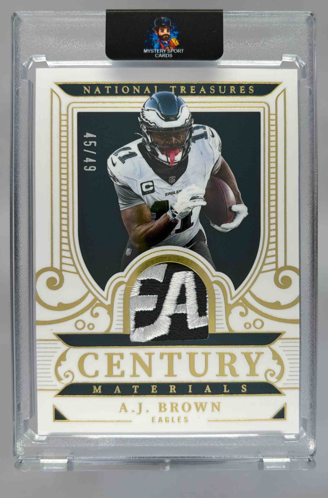 Card image for 2025 Panini National Treasures A.J. Brown Century Materials Gold /49 #CM-AJB MEM Eagles