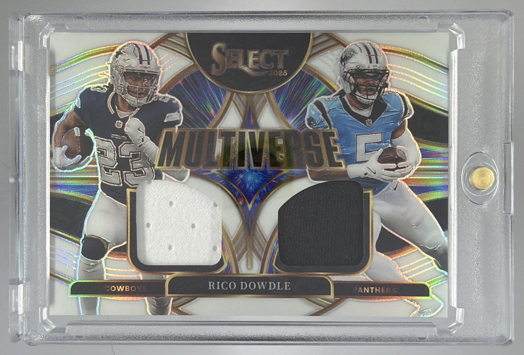Card image for 2025 Panini Select Rico Dowdle Multiverse Jerseys White Prizm /99 #MVJ-RDE