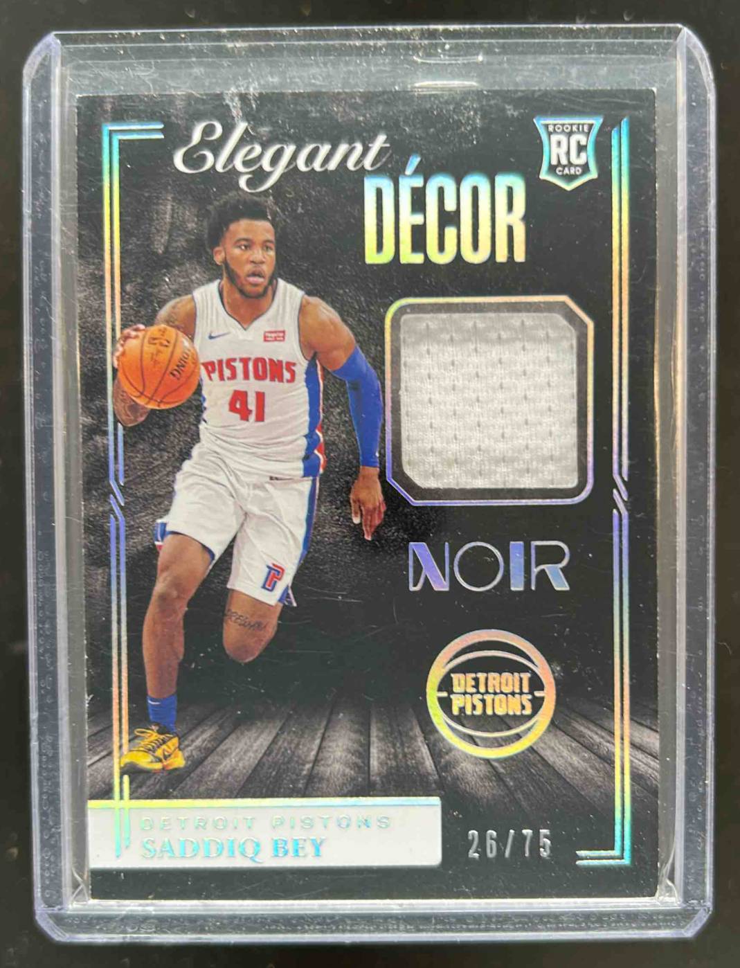 Card image for 2020-21 Panini Noir Saddiq Bey Elegant Decor Rookie Jerseys /75 #EDR-SBY MEM RC