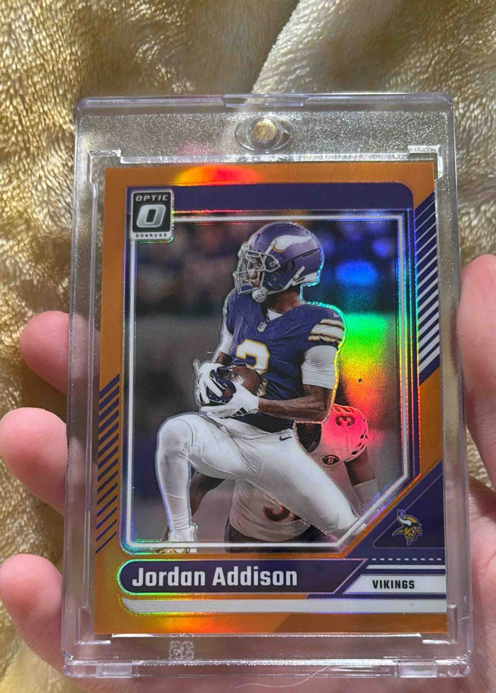 Card image for 2024 Panini Donruss Optic Jordan Addison Orange /249 #129 Vikings