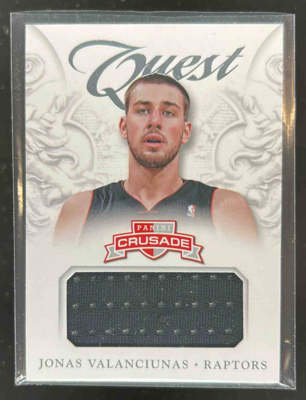 Card image for 2012-13 Panini Crusade Jonas Valanciunas Quest Memorabilia #68 RC Rookie
