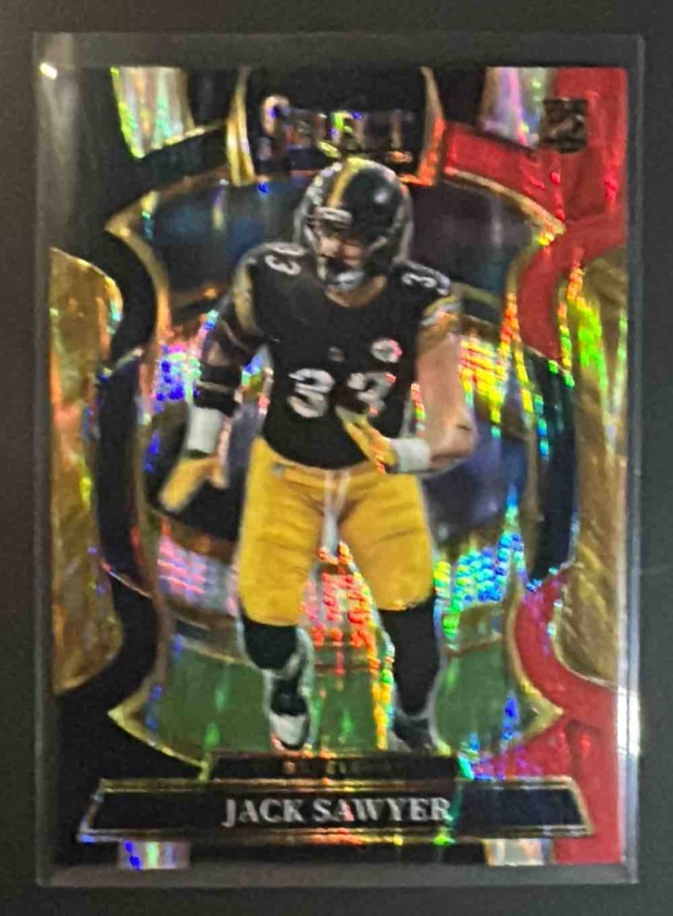 Card image for 2025 Panini Select Jack Sawyer #53 Concourse Black and Orange Prizm Shock RC