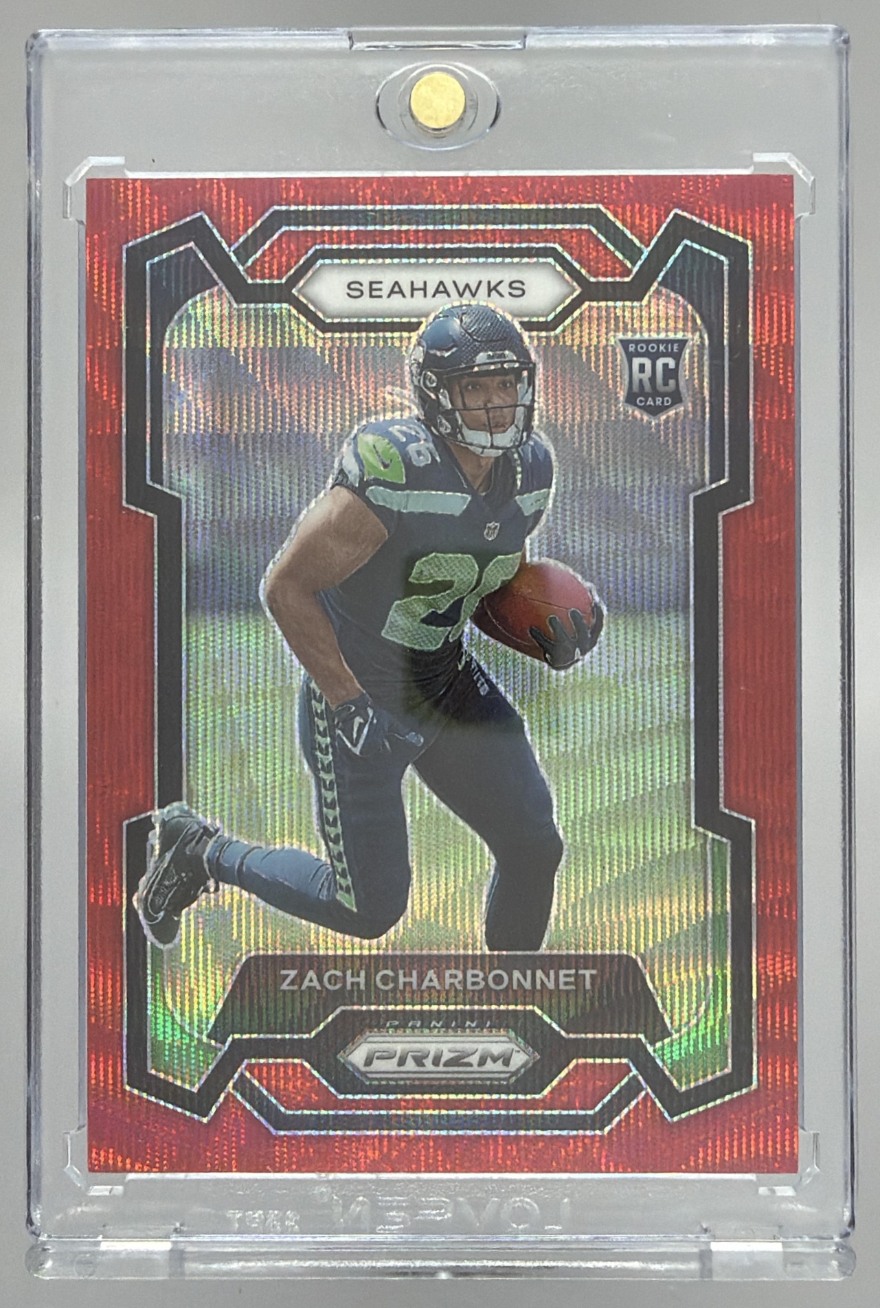 Card image for 2023 Panini Prizm Zach Charbonnet Red Wave /149 #392 RC Seahawks