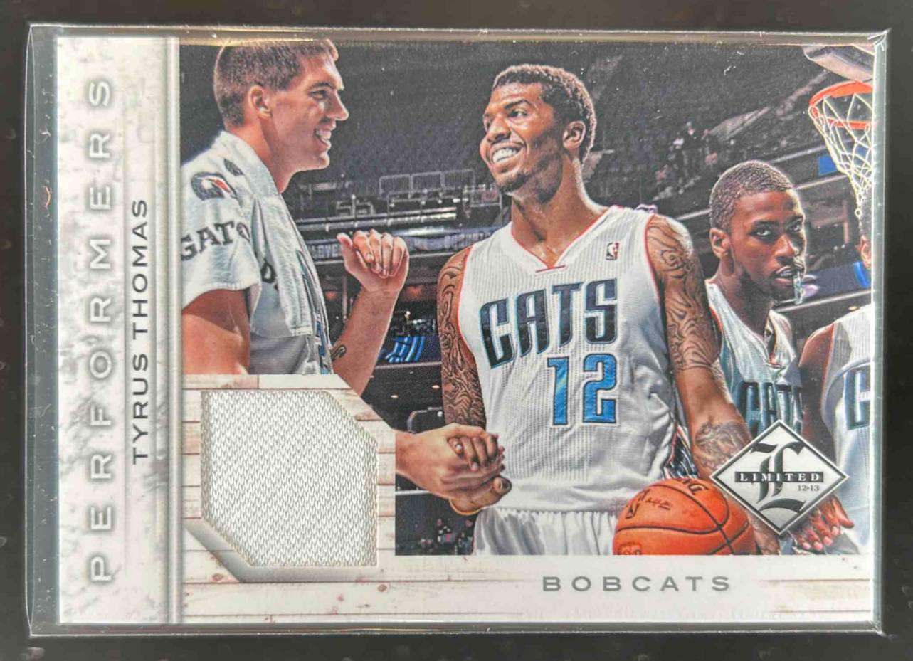 Card image for 2012-13 PANINI LIMITED TYRUS THOMAS PERFORMERS MATERIALS /199 #3