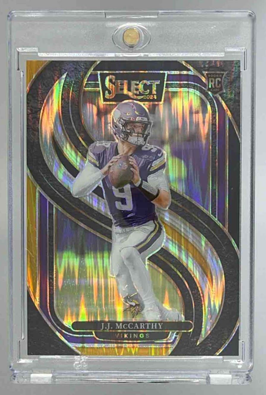 Card image for 2024 Panini Select J.J. McCarthy Premier Silver Prizm Die-Cut #134 RC Vikings