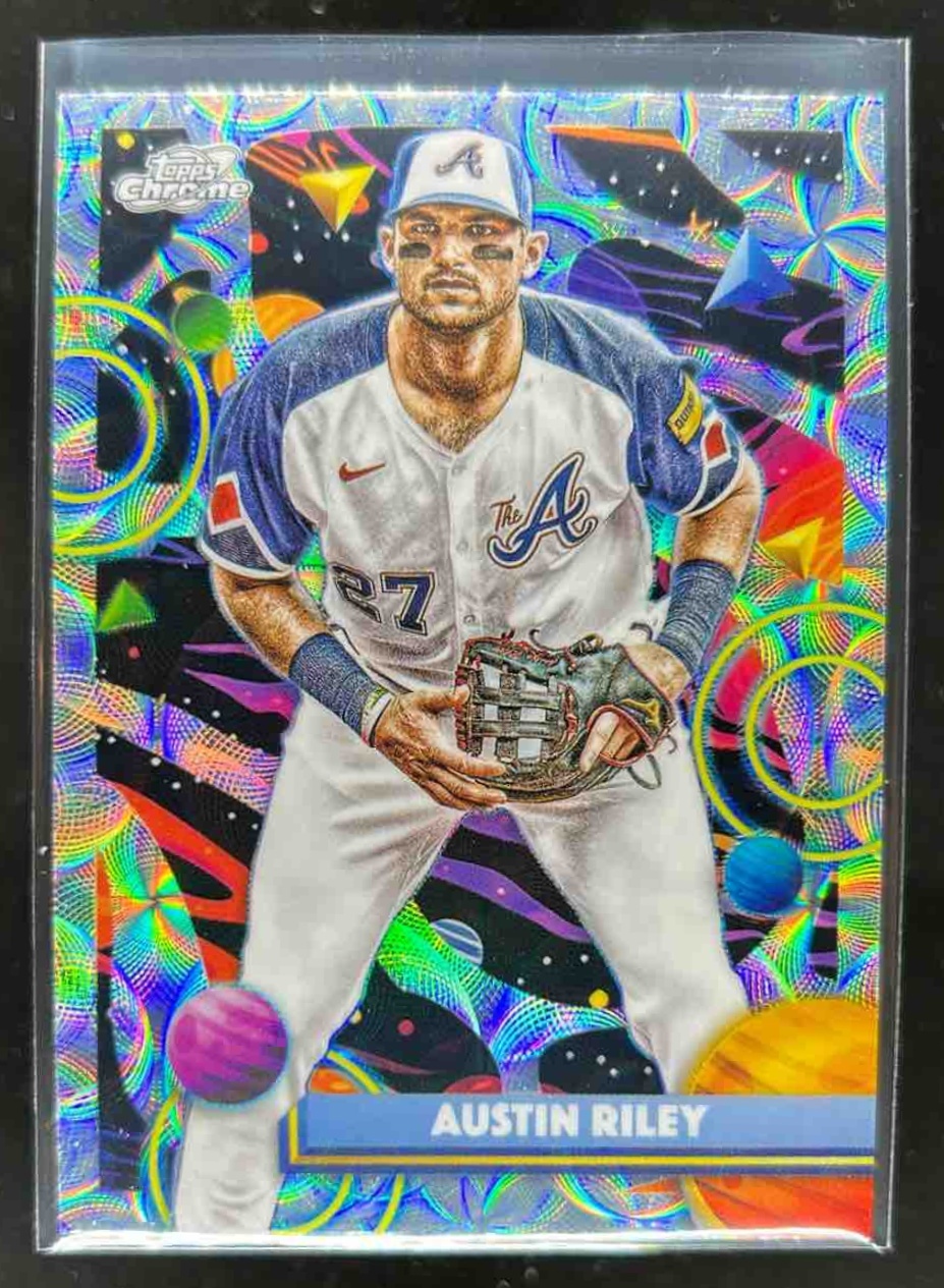 Card image for Austin Riley 2025 Topps Baseball Cosmic Chrome Nucleus Refractor Atlanta Braves