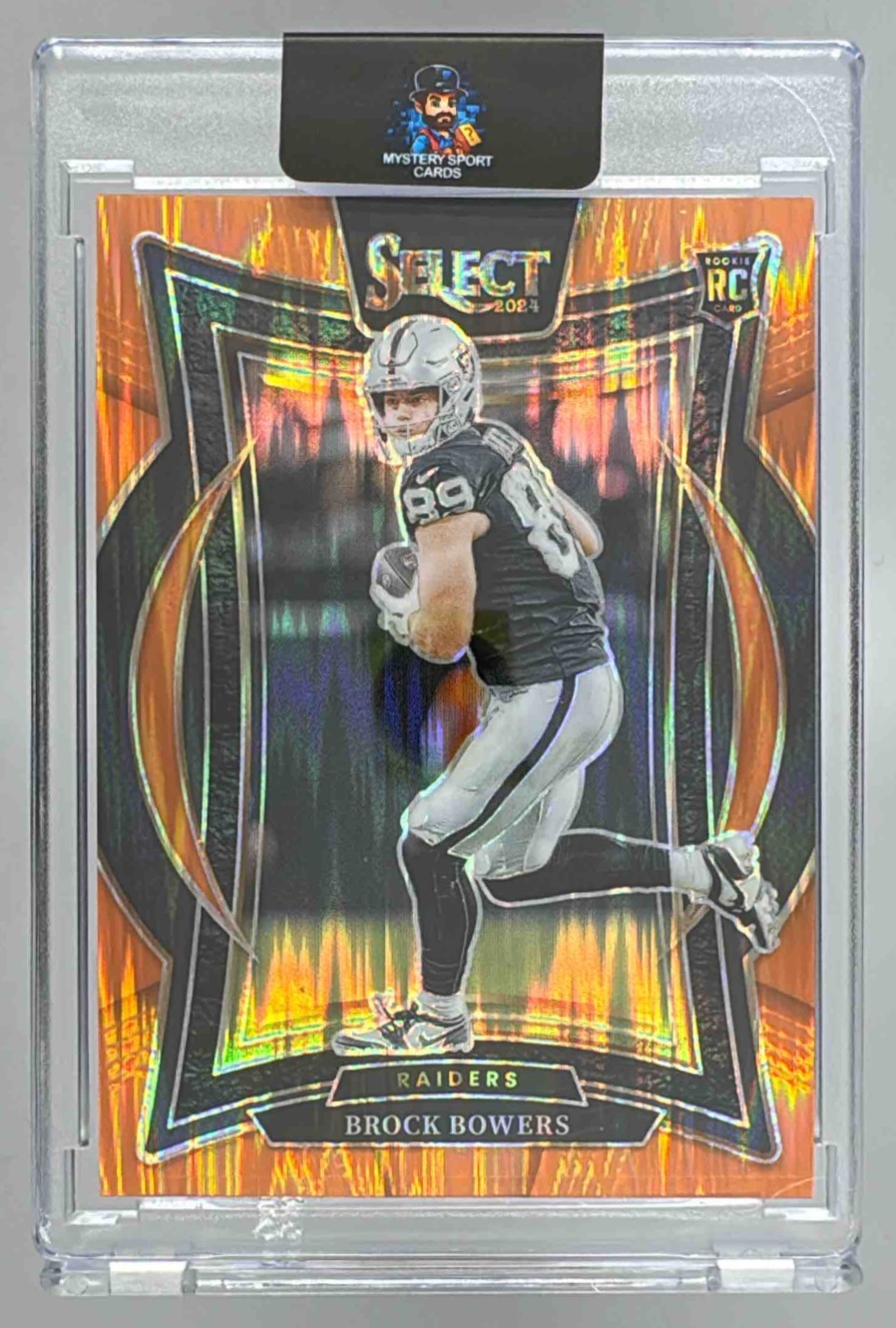 Card image for 2024 Panini Select Brock Bowers Concourse Orange Prizm Shock /499 #31 RC Raiders