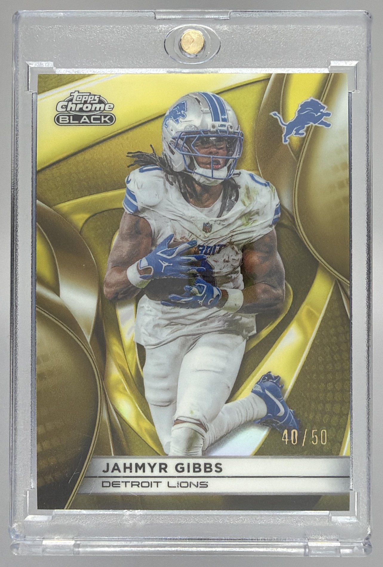 Card image for 2025 Topps Chrome Black Jahmyr Gibbs Gold Refractor /50 #37 Lions