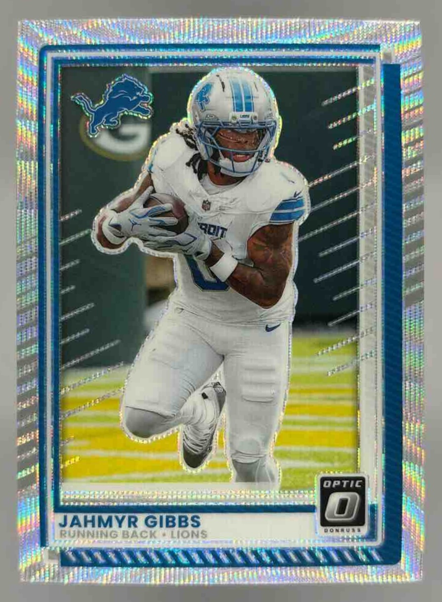 Card image for 2025 Panini Donruss Optic Jahmyr Gibbs Wave Prizm /300 #79 Lions