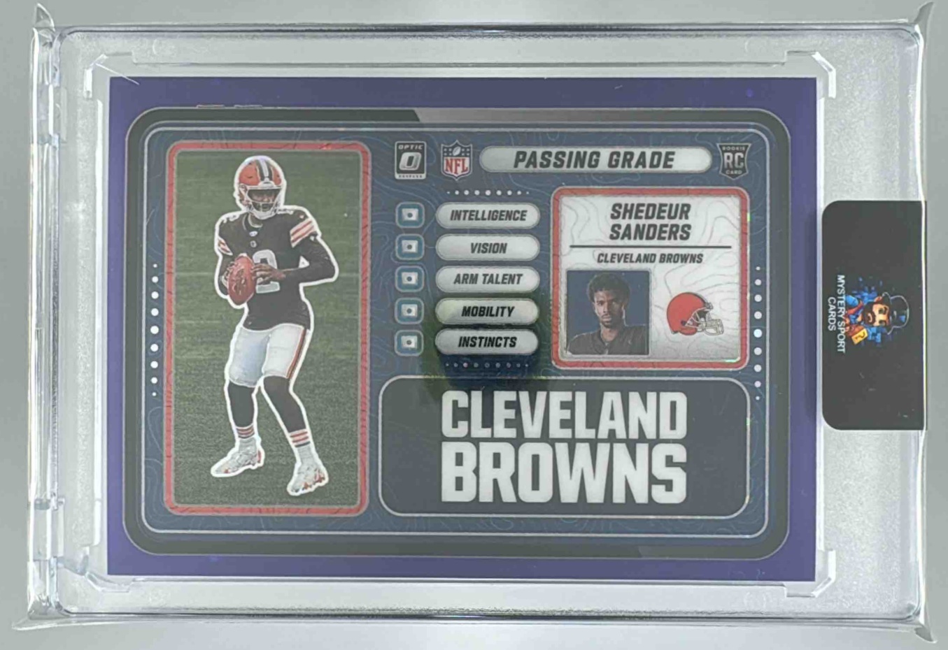 Card image for 2025 Panini Donruss Optic Shedeur Sanders Passing Grade Purple Stars Prizm /25 #3 RC Browns