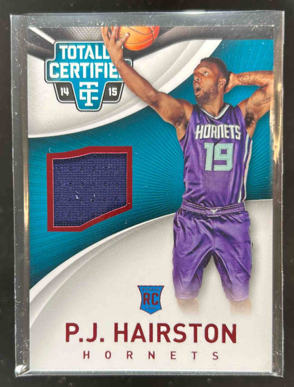Card image for 2014-15 Panini Totally Certified P.J. Hairston Jerseys Red 62 /249 #100 RC