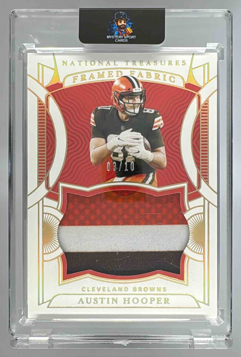 Card image for 2021 Panini National Treasures Austin Hooper Framed Fabric Holo Gold /10 #FF-AH MEM Browns