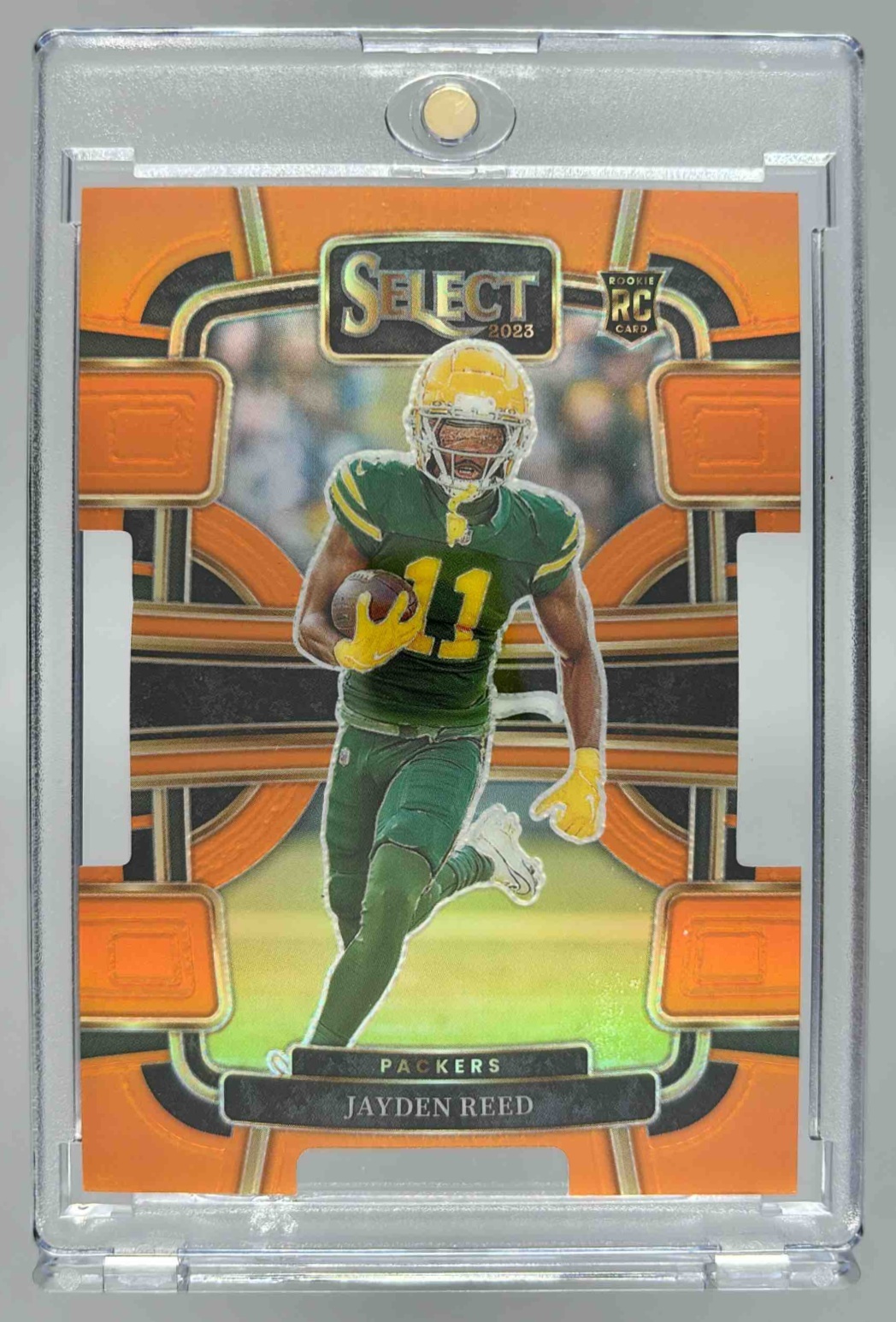 Card image for 2023 Panini Select Jayden Reed Orange Prizms Die Cut /499 #38 RC Concourse Packers