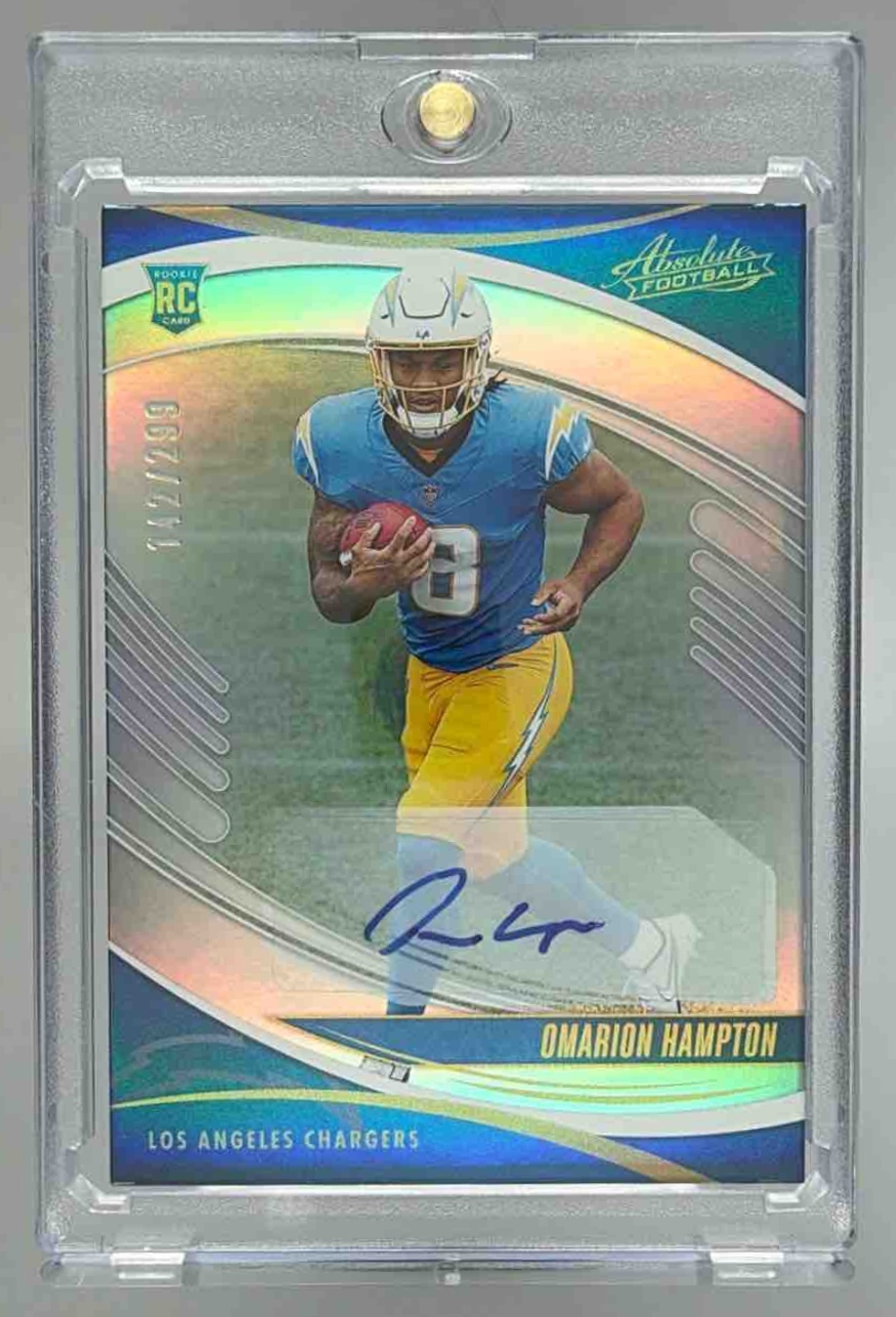 Card image for 2025 Panini Absolute Omarion Hampton Signature Rookies Spectrum /299 #166 RC Auto Chargers