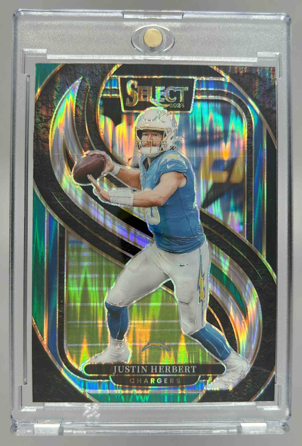 Card image for 2024 Panini Select Justin Herbert Premier Red and Blue Prizm Shock #131 Chargers