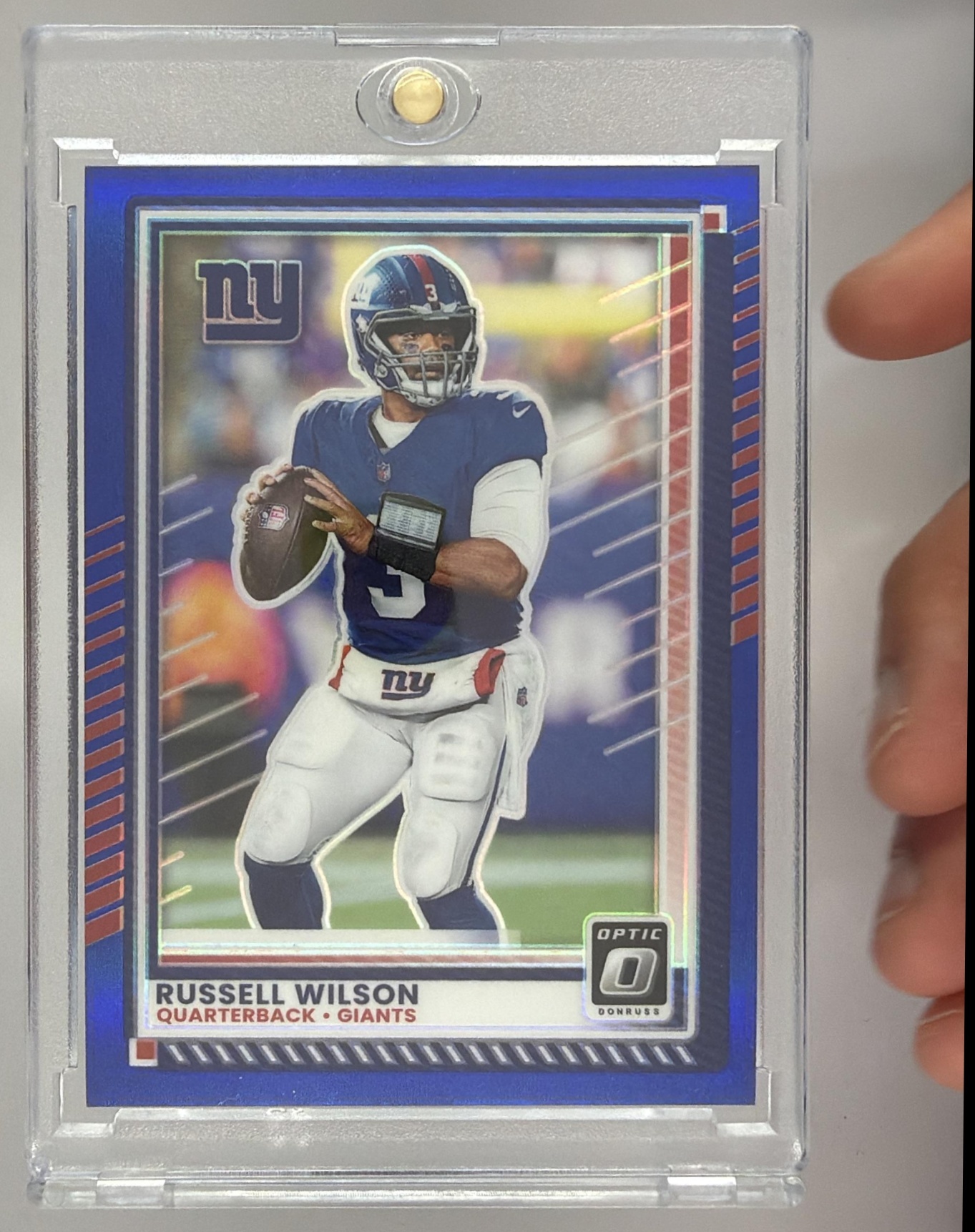 Card image for 2025 Panini Donruss Optic Russell Wilson Blue Prizm /249 #50 Giants