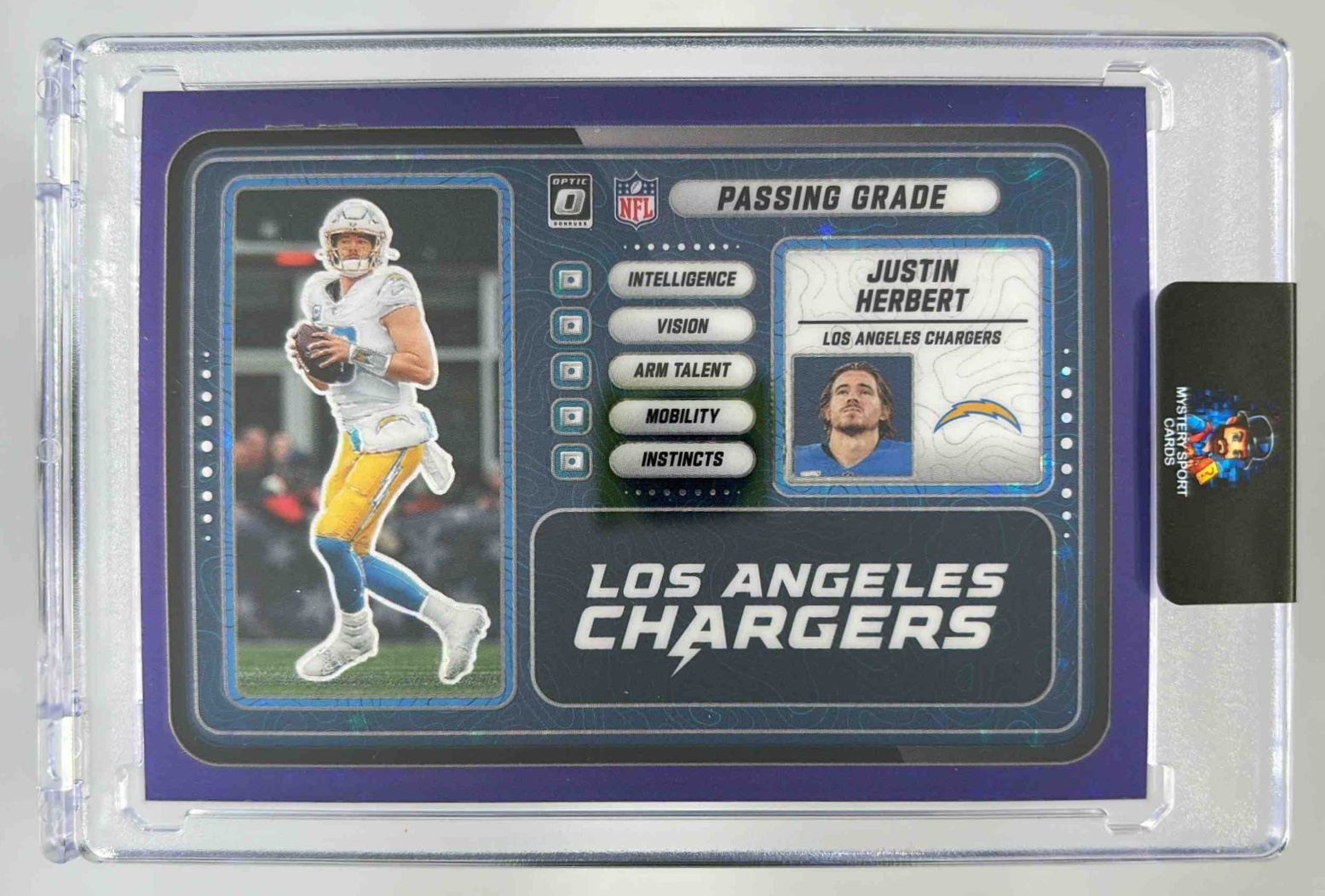 Card image for 2025 Panini Donruss Optic Justin Herbert Passing Grade Purple Stars Prizm /25 #10 Chargers