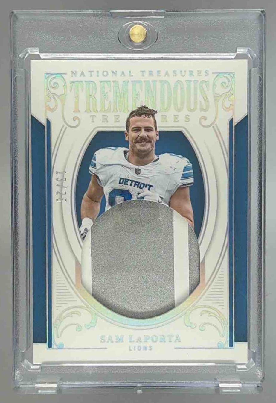 Card image for 2025 Panini National Treasures Sam LaPorta Tremendous Holo Silver /25 #TT-SLA Lions