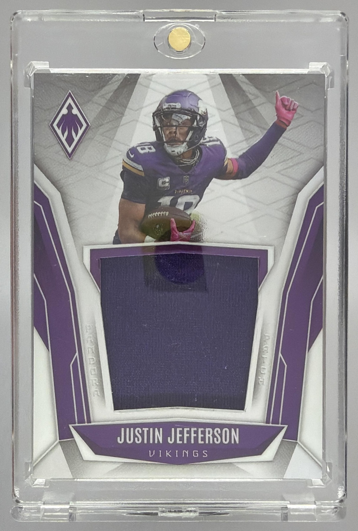 Card image for 2025 Panini Phoenix Justin Jefferson Pandora Patch /299 #PAP-JJN MEM Vikings