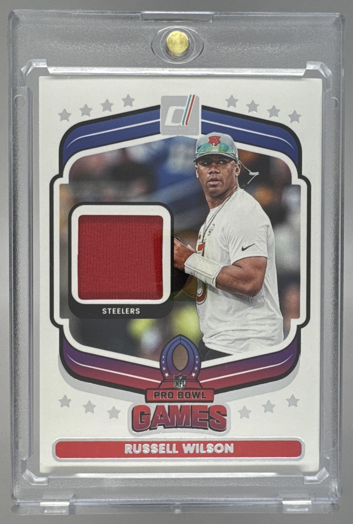 Card image for 2025 Panini Donruss Russell Wilson Pro Bowl Materials #PBM-RWN MEM Steelers