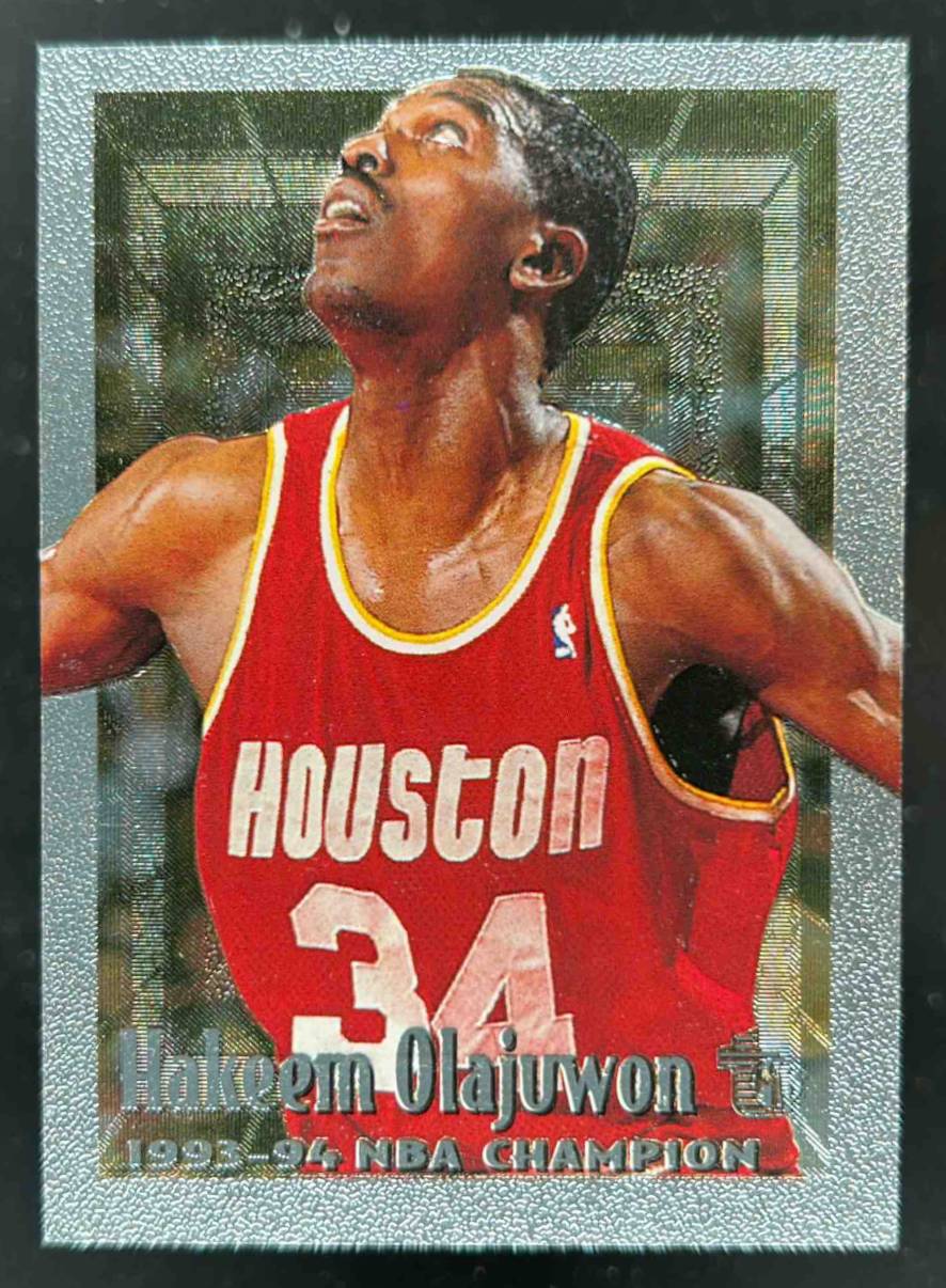 Card image for 1994-95 TOPPS EMBOSSED HAKEEM OLAJUWON #38 HOUSTON ROCKETS