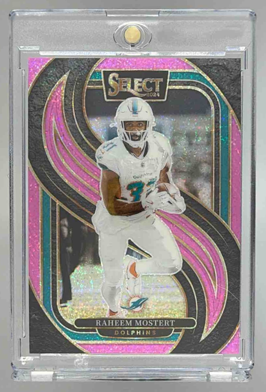 Card image for 2024 Panini Select Raheem Mostert Premier Pink Glitter Prizm /15 #188 Dolphins