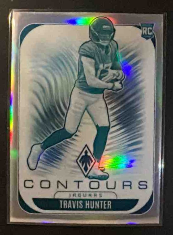 Card image for 2025 Panini Phoenix Travis Hunter #15 Contours RC Jaguars