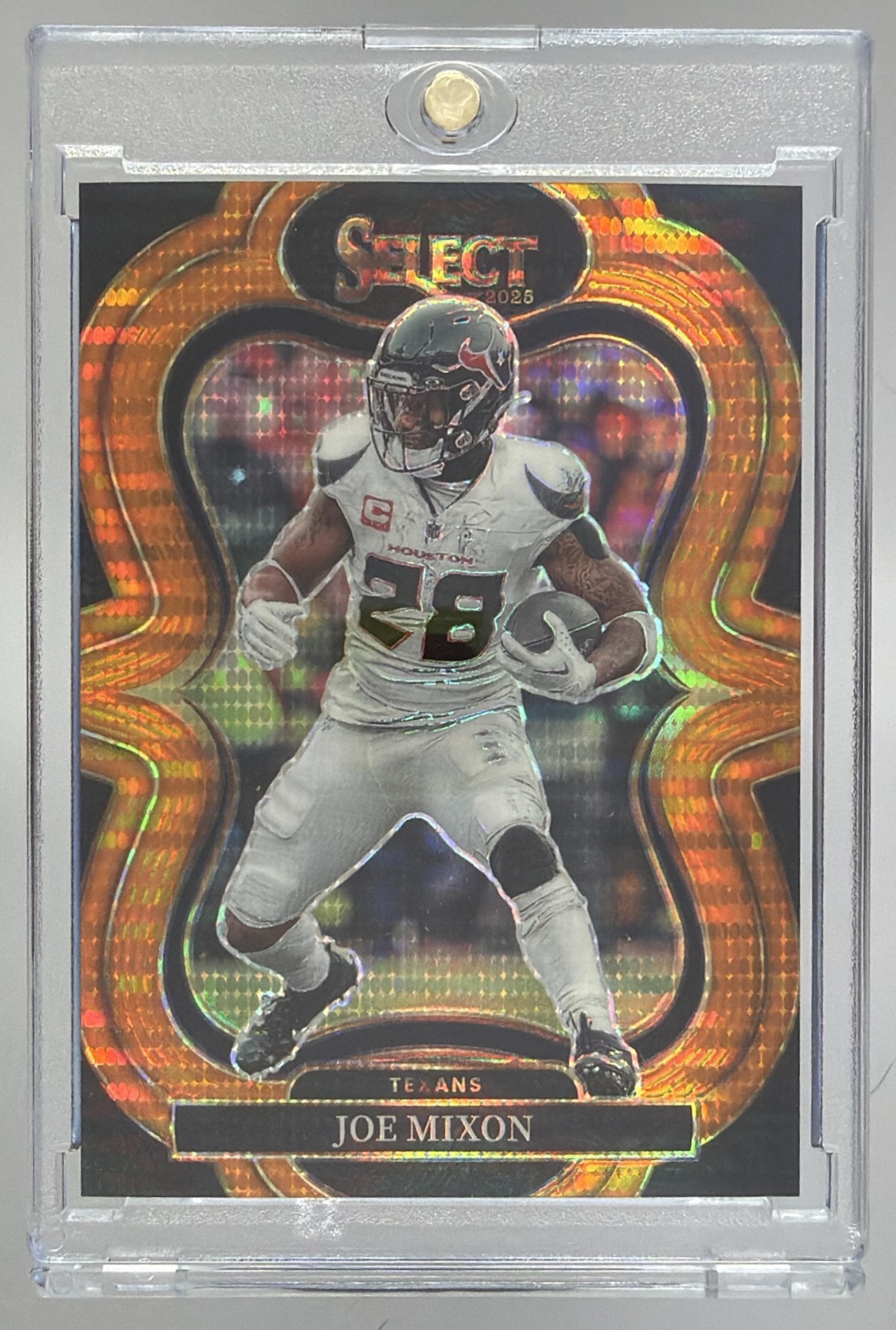 Card image for 2025 Panini Select Joe Mixon Suite Level Neon Orange Pulsar Prizm /7 #335 Texans