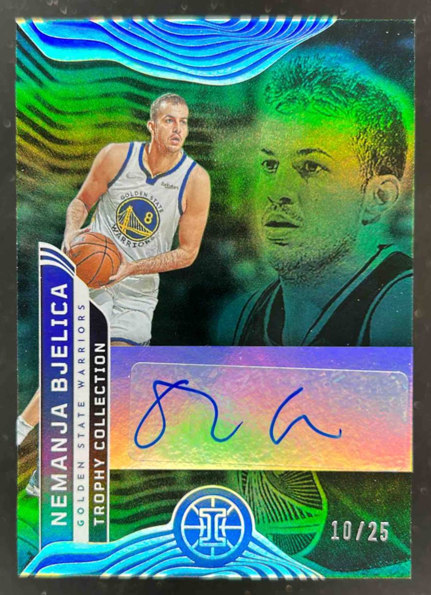 Card image for 2021-22 Panini Illusions Nemanja Bjelica Trophy Collection Signatures Emerald 10 /25 #TC-NBD Auto