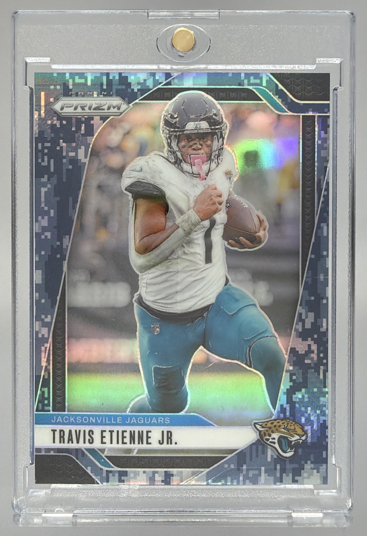 Card image for 2024 Panini Prizm Travis Etienne Jr. Navy Camo /25 #130 Jaguars
