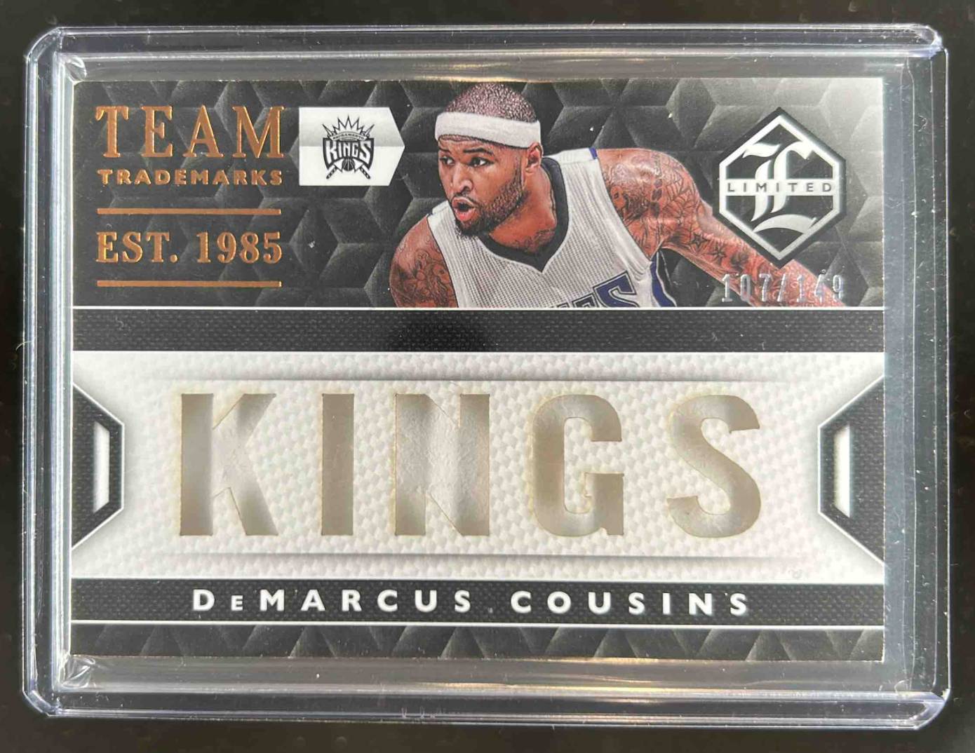 Card image for 2015-16 Panini Limited DeMarcus Cousins Team Trademarks 107 /149 #26