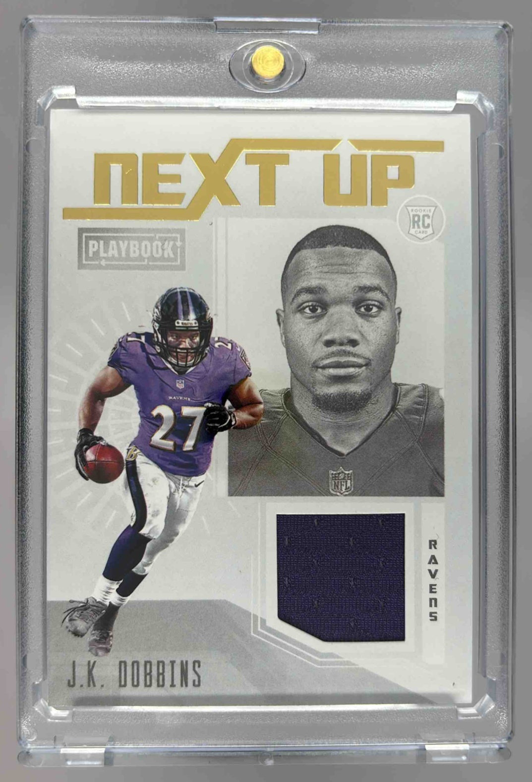 Card image for 2020 Panini Playbook J.K. Dobbins Next Up Jerseys #NU-13 RC MEM Ravens