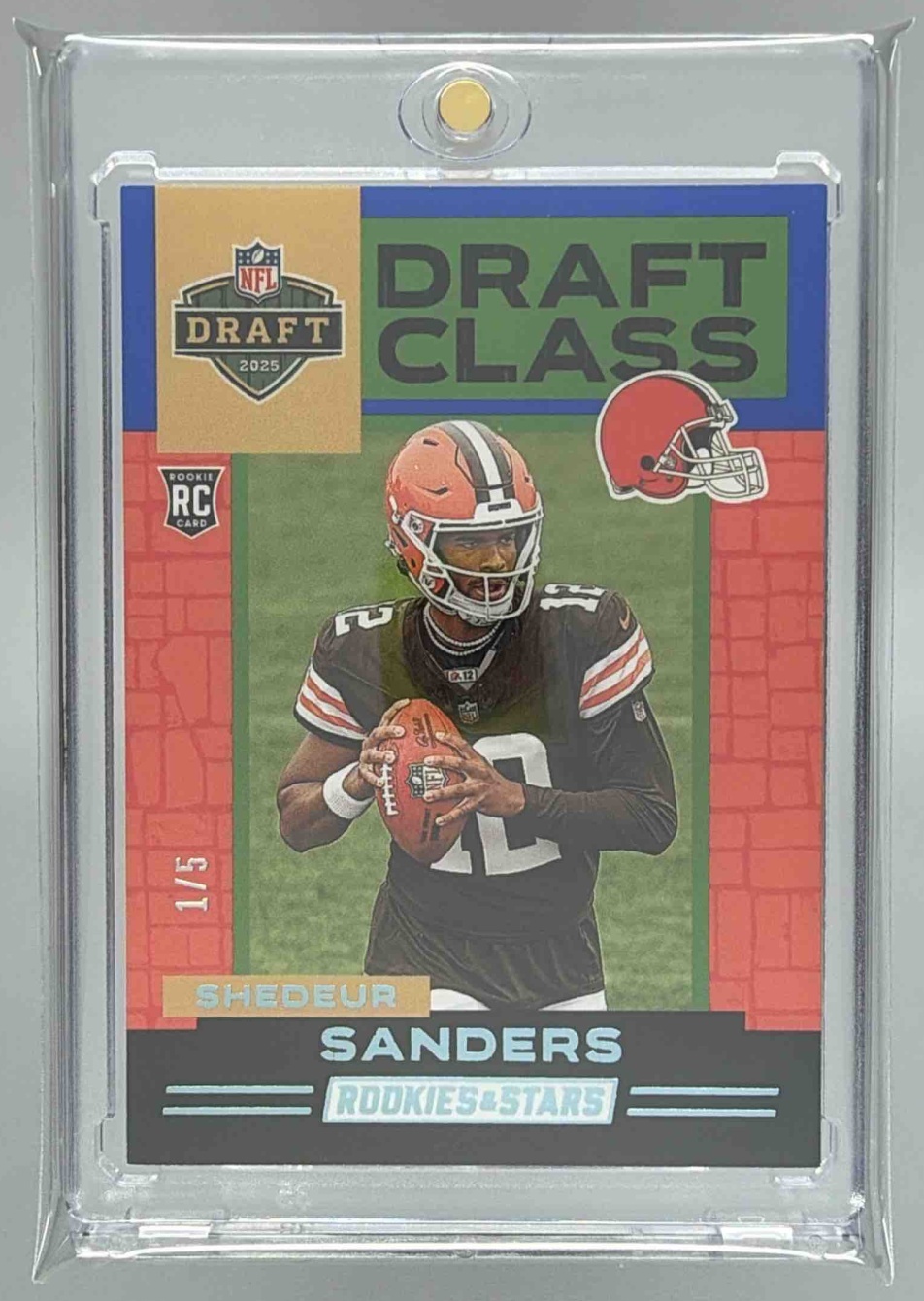 Card image for 2025 Panini Rookies & Stars Shedeur Sanders Draft Class Black and Blue /5 #19 RC Browns