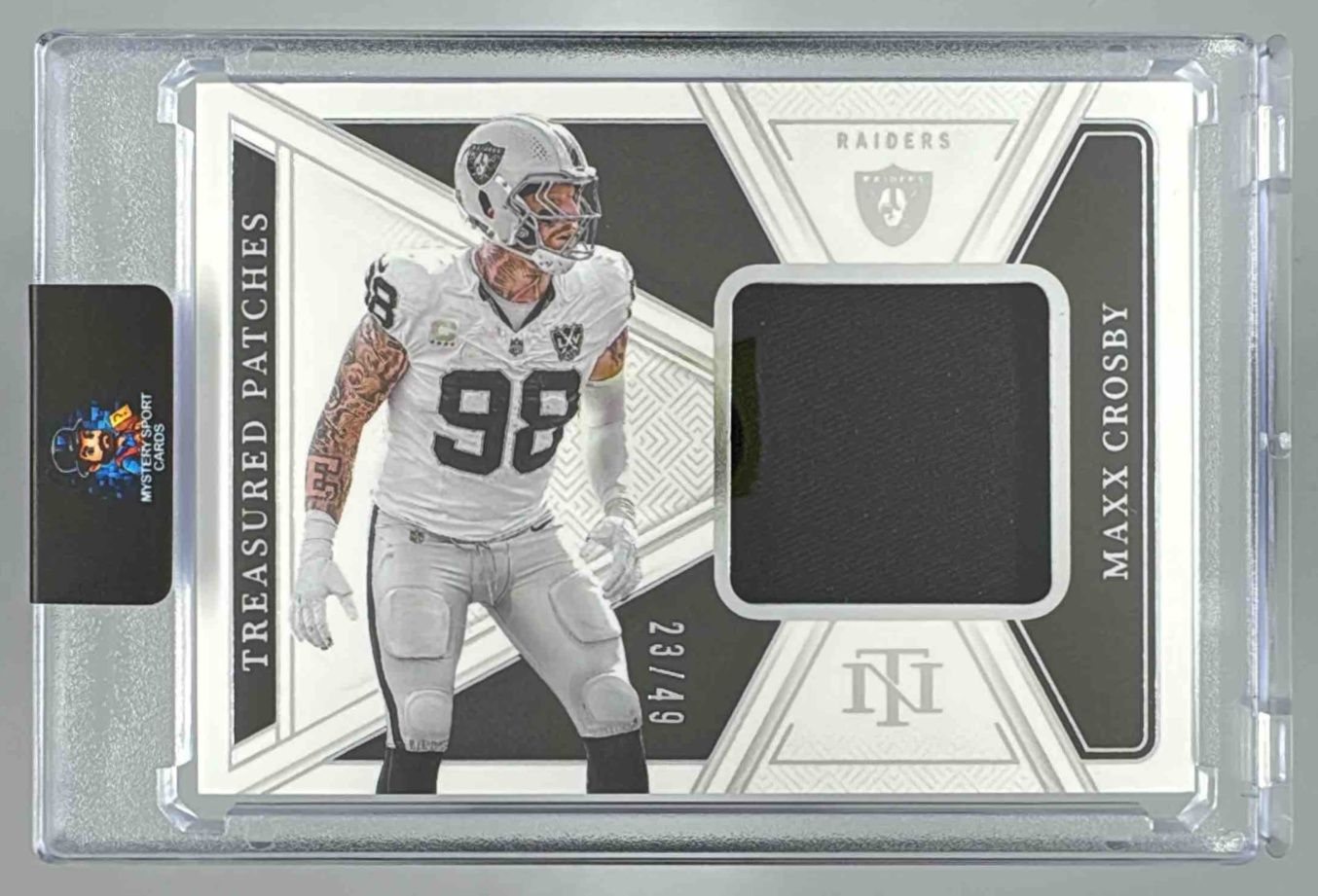 Card image for 2024 Panini National Treasures Maxx Crosby Treasured Patches /49 #TP-MCY Raiders