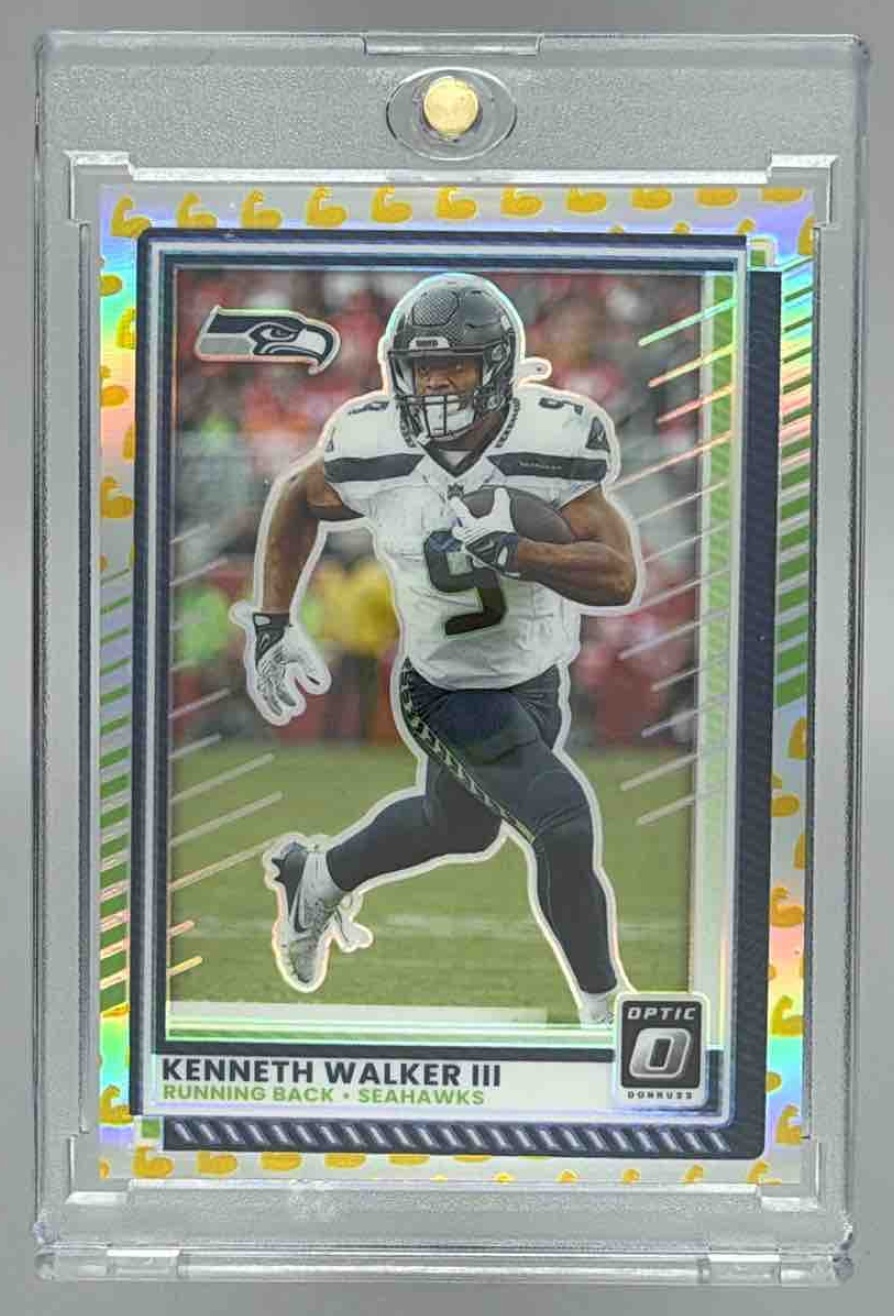 Card image for 2025 Panini Donruss Optic Kenneth Walker III Flex Prizm /199 #133 Seahawks