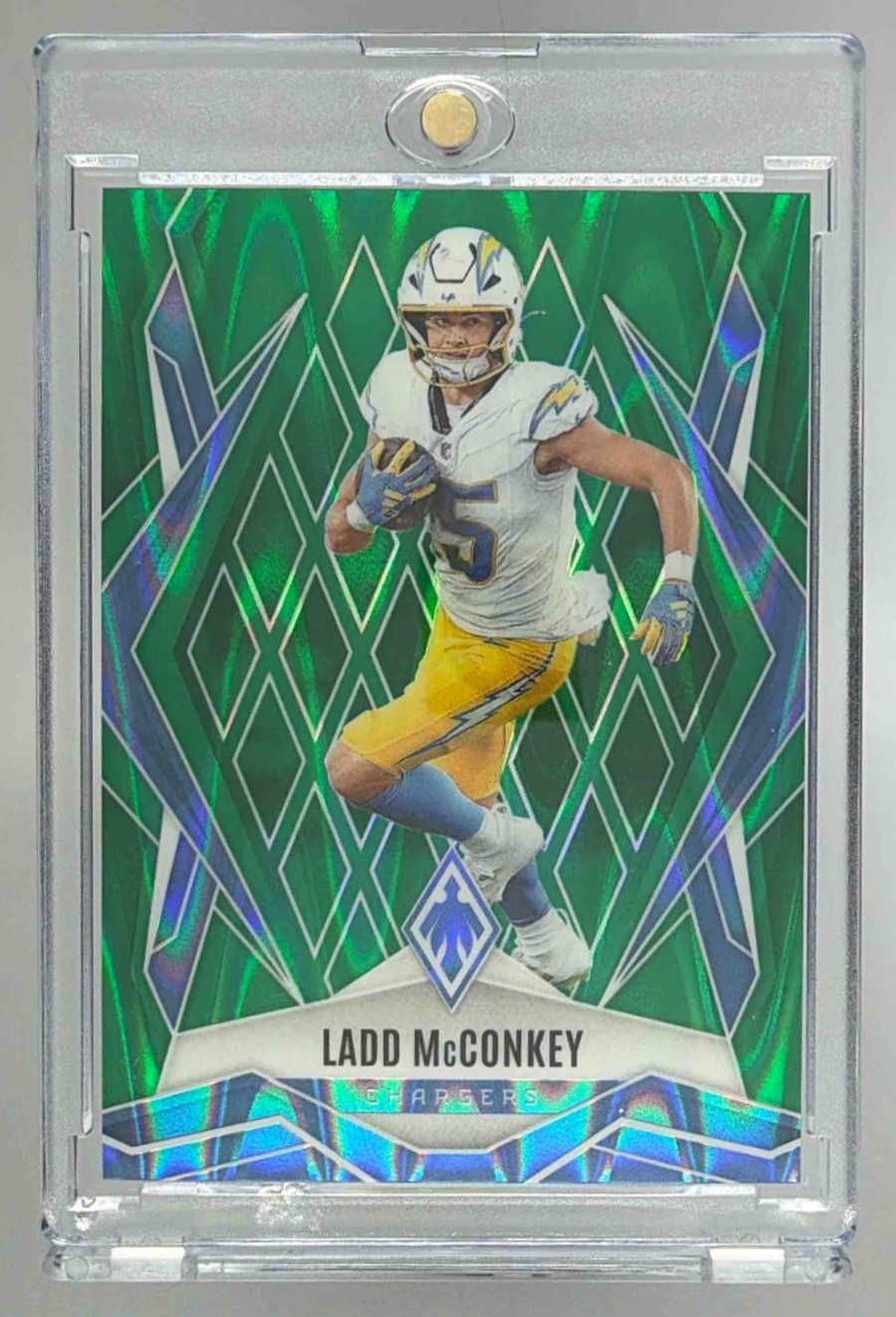 Card image for 2025 Panini Phoenix Ladd McConkey Green Seismic /25 #66 Chargers