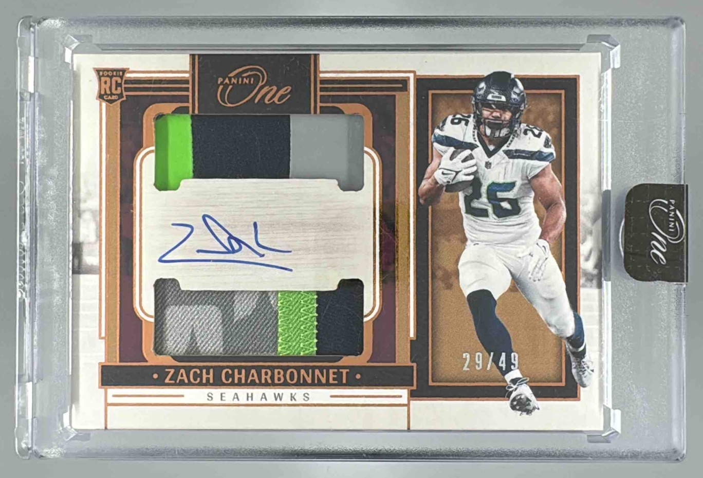 Card image for 2023 Panini One Zach Charbonnet Bronze /49 #29 MEM Auto RC Seahawks