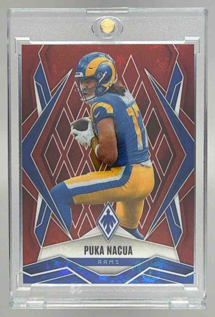 Card image for 2025 Panini Football Phoenix Puka Nacua Red Winter /399 #119 Los Angeles Rams