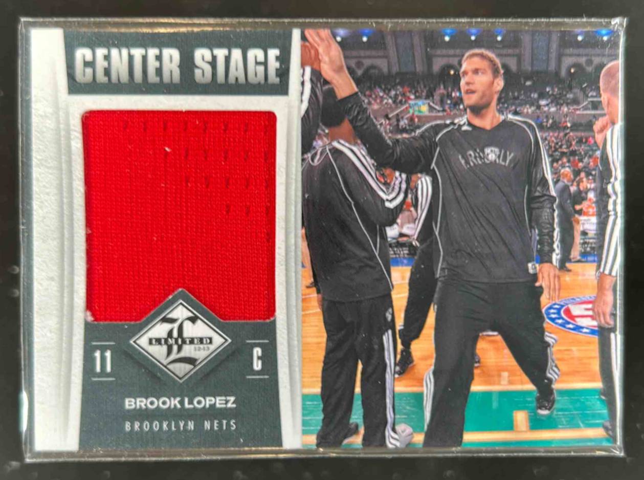 Card image for 2012-13 PANINI LIMITED BROOK LOPEZ CENTER STAGE MATERIALS /199 #46