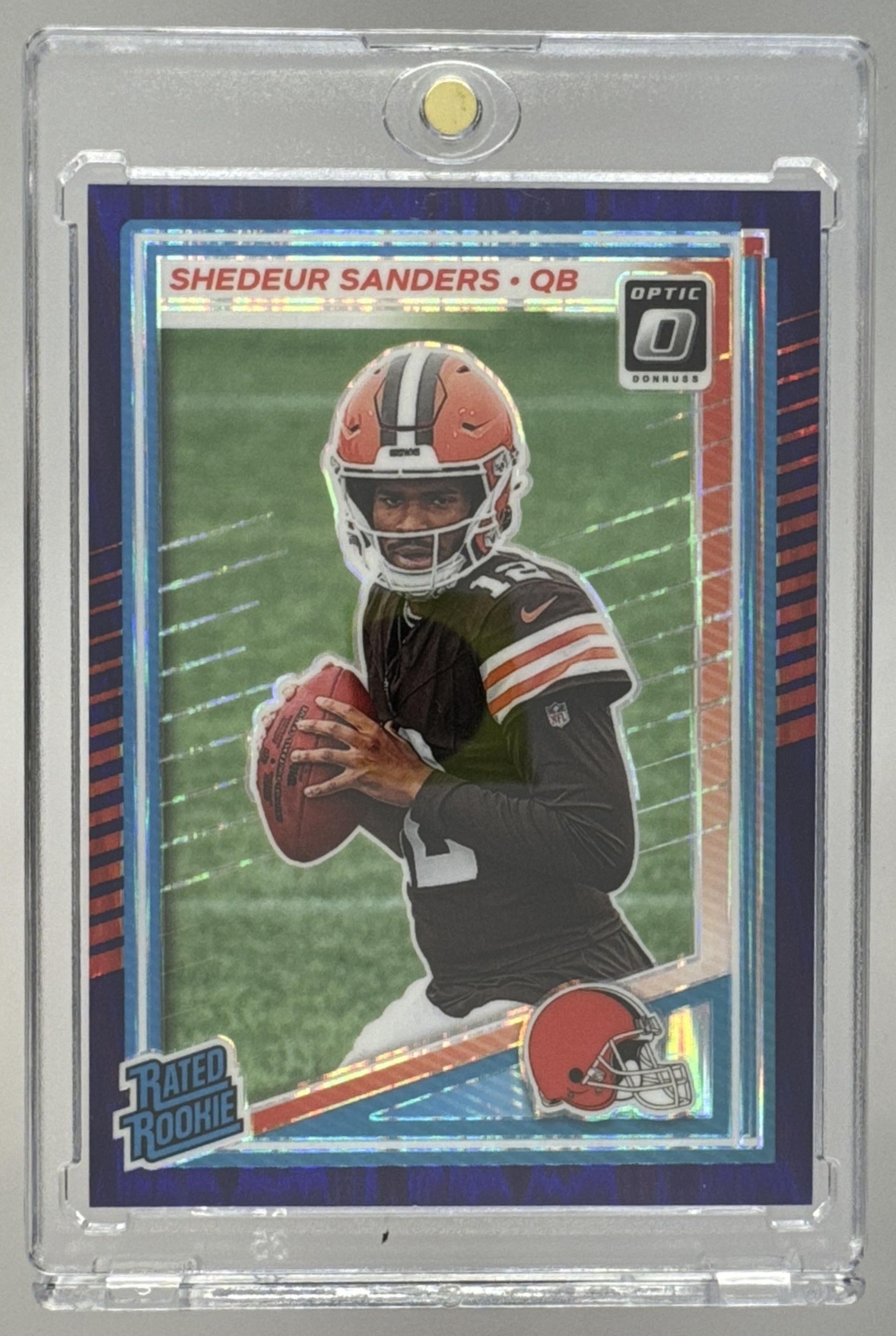 Card image for 2025 Panini Donruss Optic Shedeur Sanders Rated Rookie Holo Prizm #203 Browns