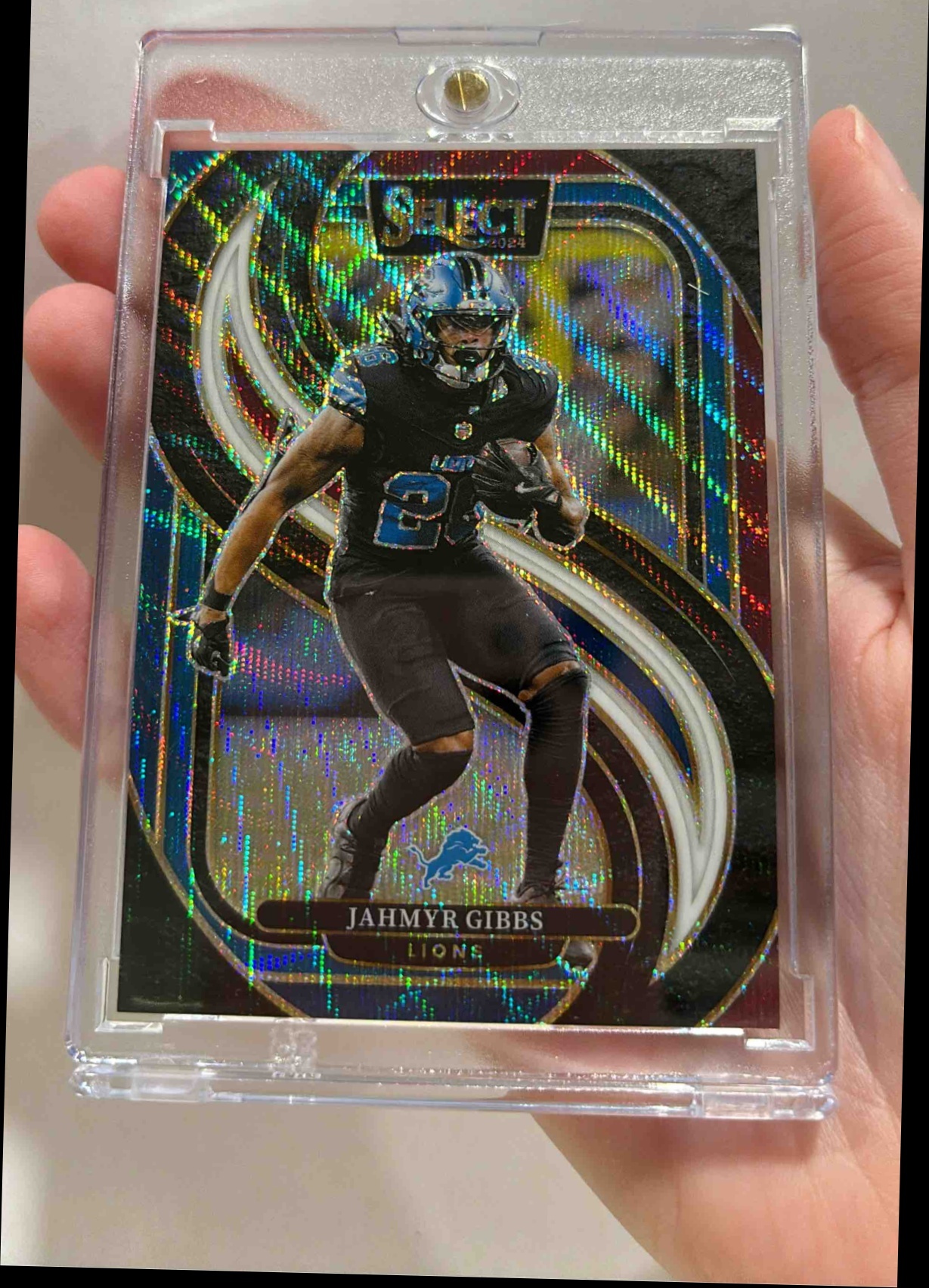 Card image for 2024 Panini Select Jahmyr Gibbs Premier Tri-Color Prizm /249 #163 Lions