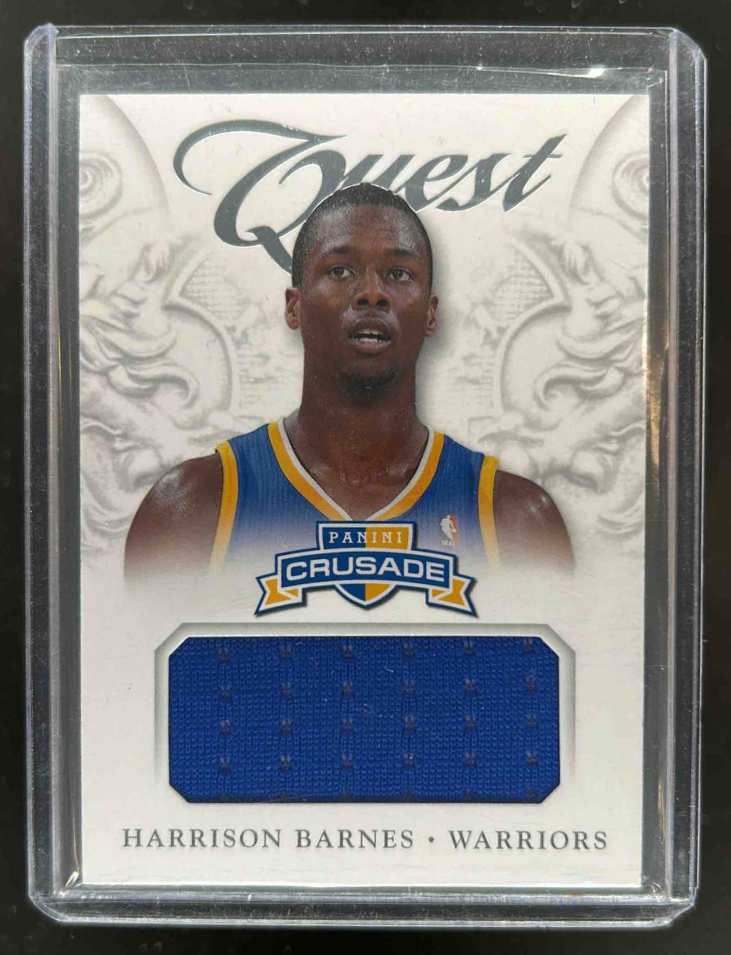 Card image for 2012-13 Panini Crusade Harrison Barnes Quest Memorabilia #76 RC Rookie