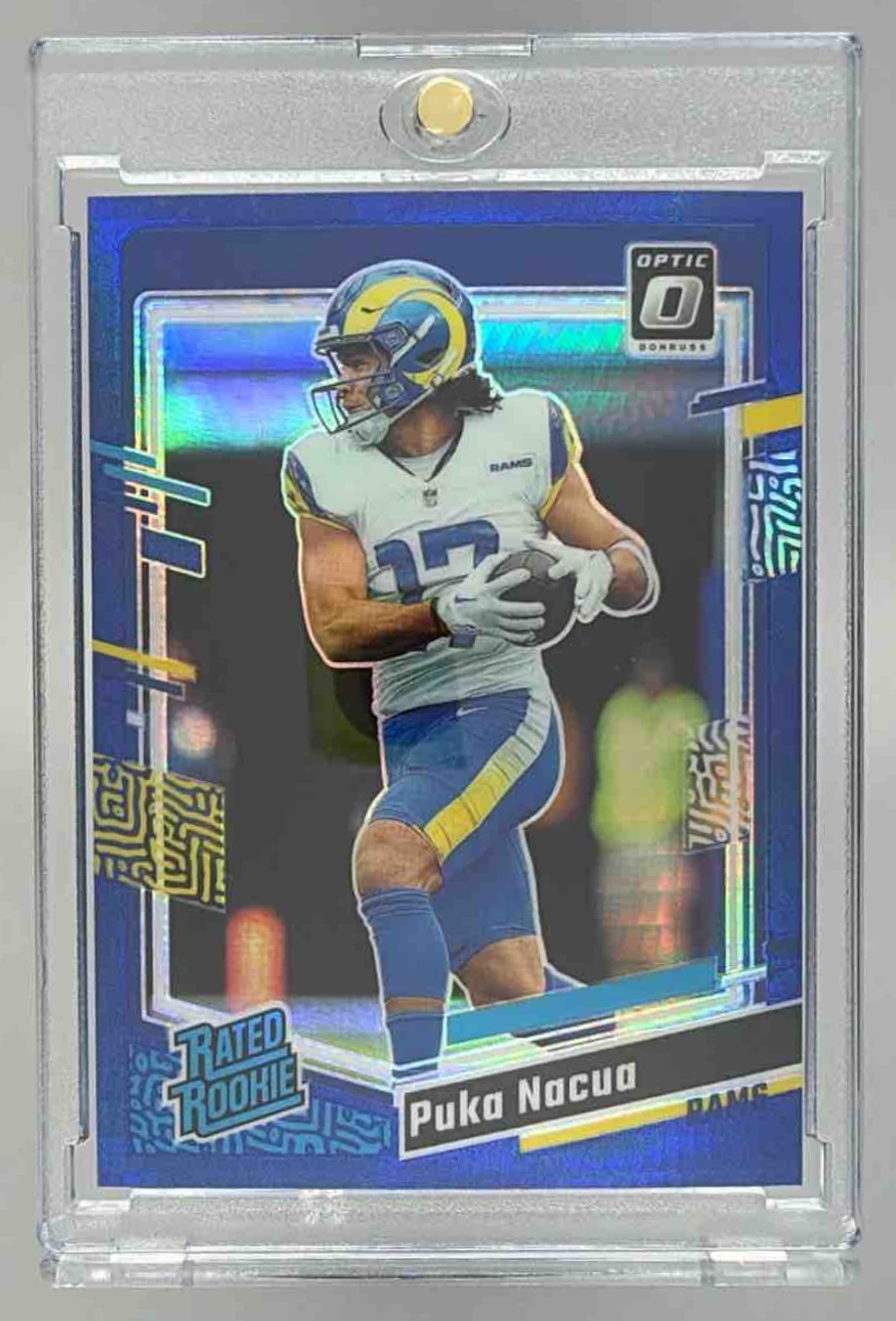 Card image for 2023 Panini Donruss Optic Puka Nacua Holo Prizm #238 RC Rated Rookie Rams