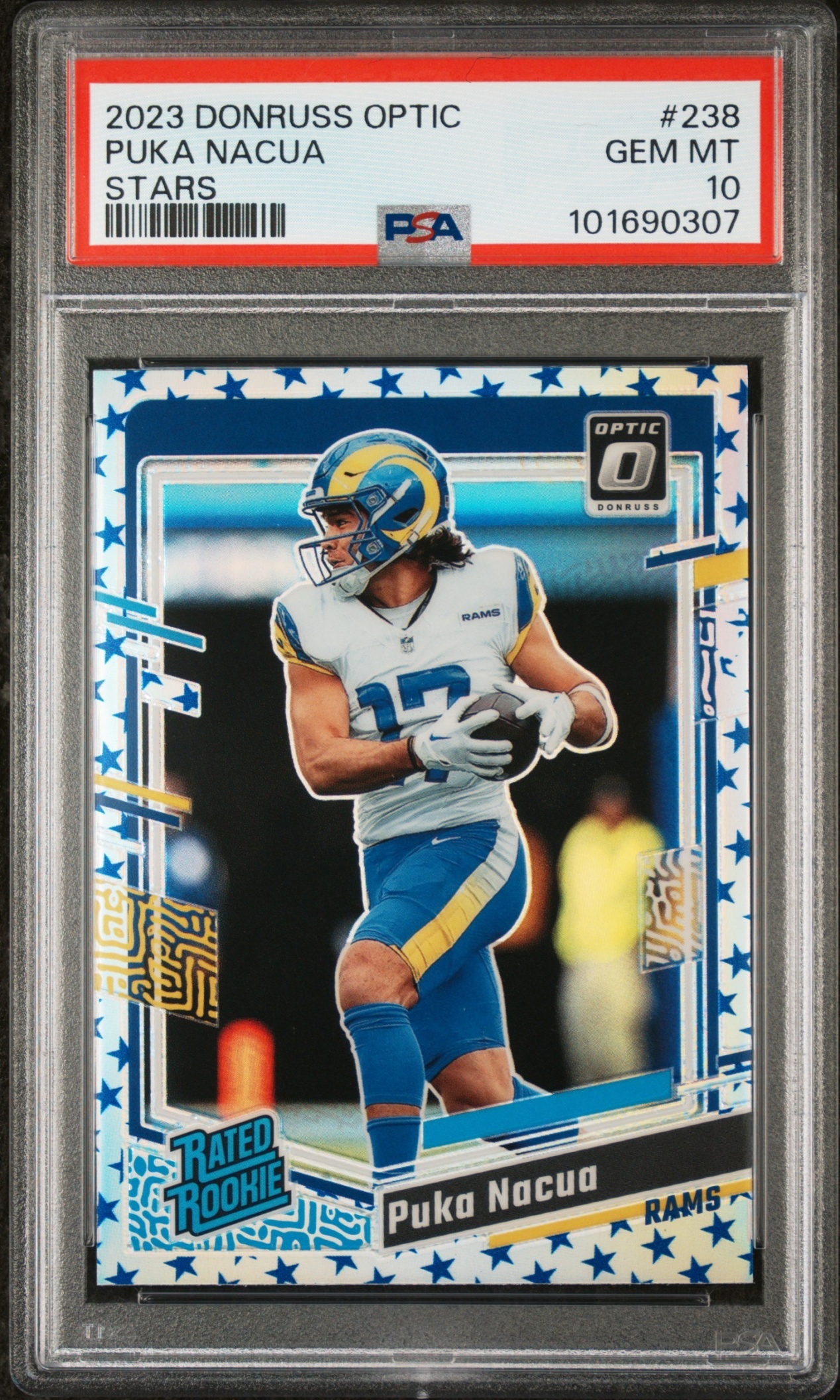 Card image for 2023 Panini Donruss Optic Puka Nacua Red Stars Prizm #238 RC Rated Rookie Rams