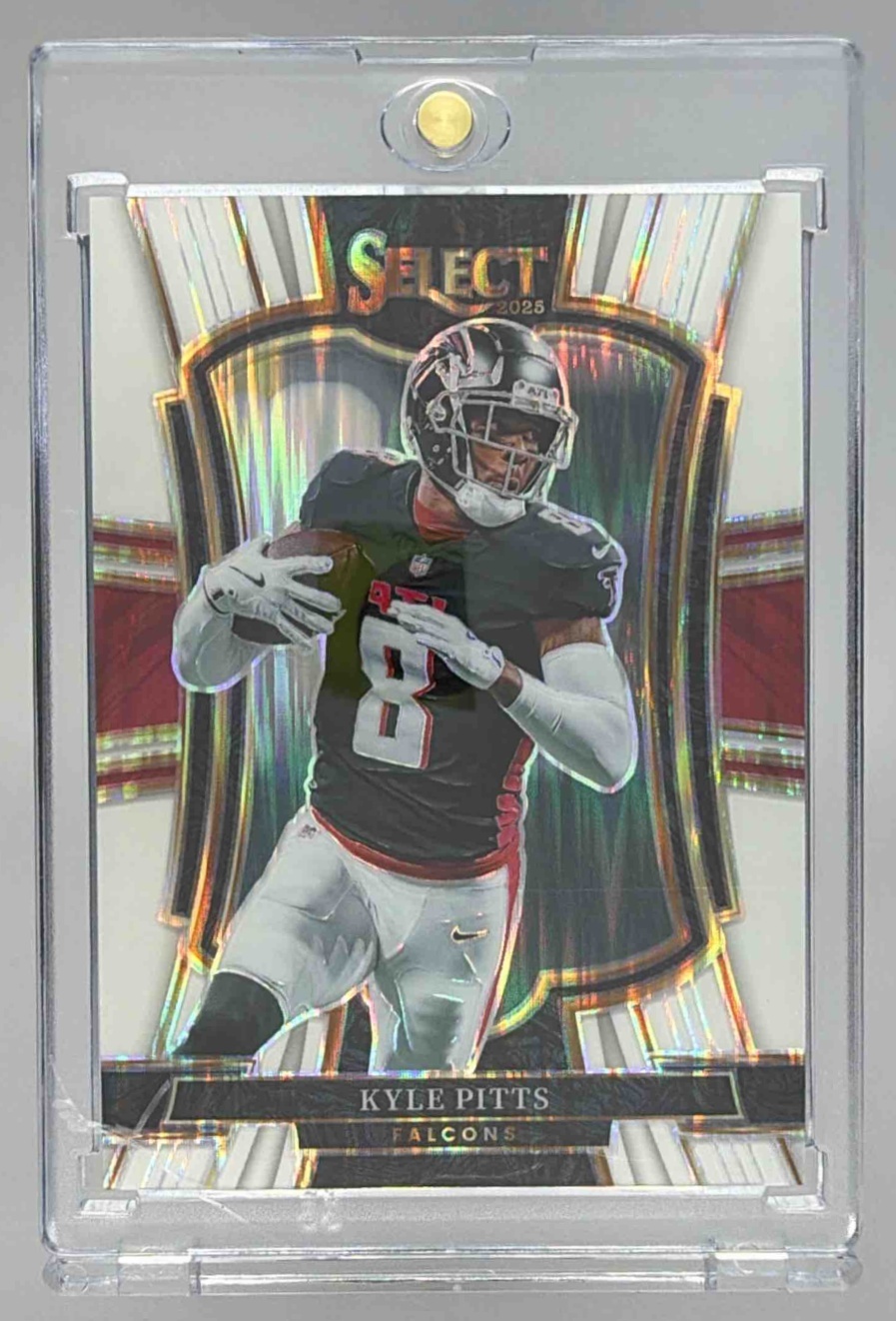 Card image for 2025 Panini Select Kyle Pitts Premier Level White Prizm Shock /799 #147 Falcons
