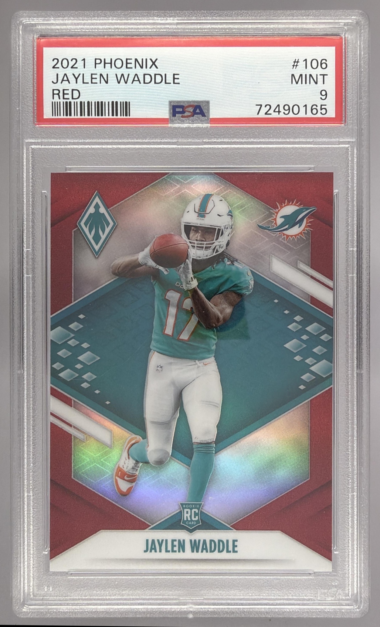 Card image for 2021 Panini Football Phoenix Jaylen Waddle Red /250 #106 RC Miami Dolphins